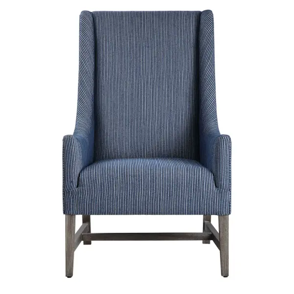 Showcasing A Classic Wingback Style With A Coastal Feel, This Accent Chair Features A Blue And White Organically Striped Fabric, Resting On Naturally Finished Solid Wood Legs. Collection: Galiot Designer: Jim Parsons Finish: Blue And White Width: 27.00" Height: 44.00" Length: 33.00" Weight: 62.00 lb Material: Rubber Wood, Eucalyptus, Fabric, Foam, Plywood Country of Origin: China Safety Rating: Indoor Only