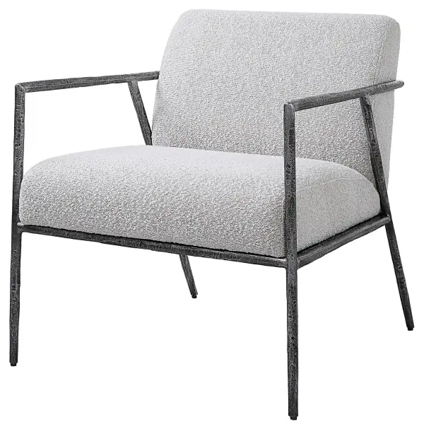 With Clean Contemporary Lines, This Open Frame Design Features A Textured Cast Iron Frame In A Natural Distressed Charcoal Finish. Paired With A Tight Upholstered Seat In A Casual Ivory And Light Gray Boucle Fabric. Collection: Brisbane Designer: Matthew Williams Finish: Natural Distressed Charcoal Width: 27.00" Height: 30.00" Length: 30.00" Weight: 65.00 lb Material: Cast Iron, Mdf, Foam, Fabric Country of Origin: Cambodia Safety Rating: Indoor Only