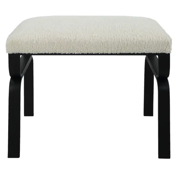 Displaying A Streamlined Black And White Design, This Small Bench Is Supported By A Curved Satin Black Iron Base With A Plush Upholstered Seat In White Faux Shearling. Collection: Diverge Designer: Renee Wightman Finish: Satin Black Width: 22.75" Height: 18.75" Length: 15.13" Weight: 15.87 lb Material: Iron, Foam, Fabric, Mdf Country of Origin: China Safety Rating: Indoor Only