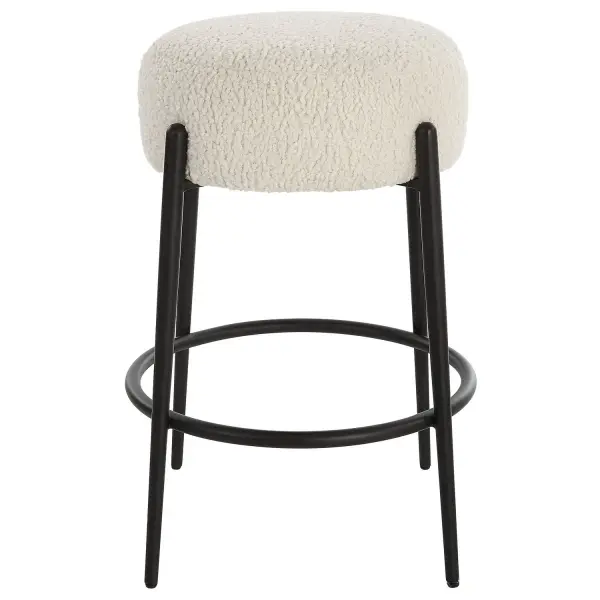 This Plush Counter Stool Is Covered In A Luxurious White Faux Shearling, Suspended Within Satin Black Finished Metal Legs. Collection: Arles Designer: Matthew Williams Finish: Satin Black Width: 20.50" Height: 26.00" Length: 20.50" Weight: 6.63 lb Material: Hardwood, Plywood, Fabric, Metal, Foam, Hardware Country of Origin: China Safety Rating: Indoor Only