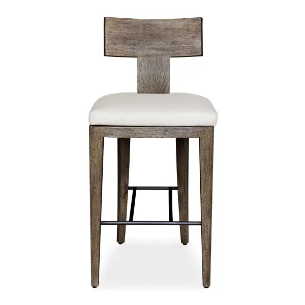 With Durability For The Outdoors In Mind, The Cellini Bar Stool Features A Gracefully Curved Mahogany Wood Frame In A Weathered Gray Finish With Wire-brushed Details. The Plush Cushion Is Upholstered In Oyster White Solution Dyed Acrylic Fabric That Is Constructed To Withstand The Moisture And Dirt That Comes With Outdoor Use. Collection: Cellini Designer: Matthew Williams Finish: Weathered Gray Width: 20.00" Height: 43.50" Length: 23.25" Weight: 20.10 lb Material: Mahogani Wood With Fabric And Metal Country of Origin: Indonesia Safety Rating: Indoor/Outdoor