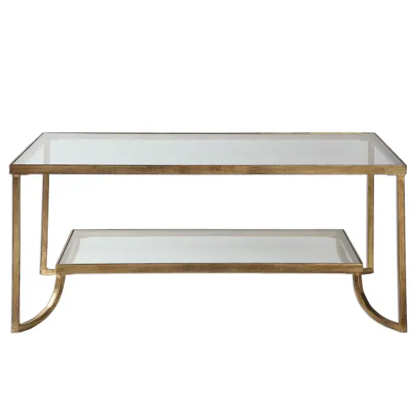 Hand Forged Iron With Lightly Antiqued Gold Leaf. Top And Gallery Shelf Are Clear, Tempered Glass. Collection: Katina Designer: Matthew Williams Finish: Antique Gold Width: 46.63" Height: 20.75" Length: 28.38" Weight: 88.84 lb Material: Iron And Glass Country of Origin: Vietnam Safety Rating: Indoor Only