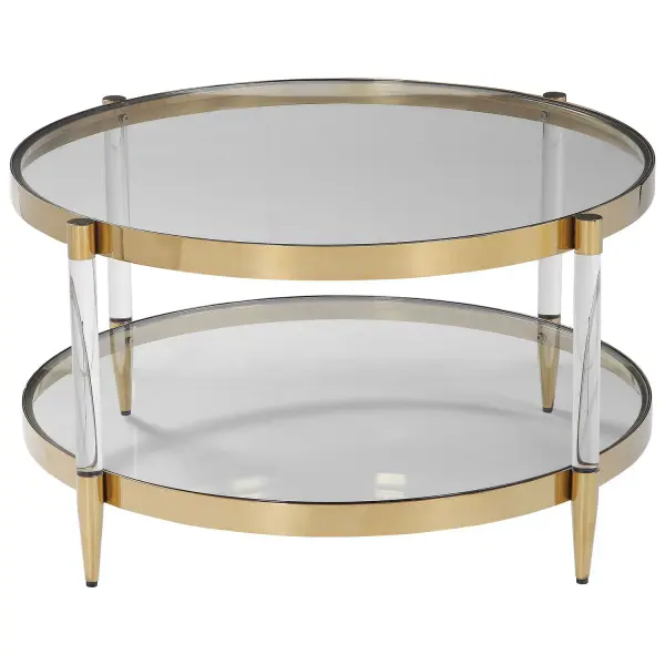 A True Glam Accent, Featuring A Gold Plated Stainless Steel Frame With Clear Glass, Acrylic Legs And Tapered Feet. Collection: Kellen Designer: Grace Feyock Finish: Stainless Steel Width: 32.00" Height: 17.25" Length: 32.00" Weight: 52.00 lb Material: Stainless Steel, Glass, Acrylic Country of Origin: Cambodia Safety Rating: Indoor Only