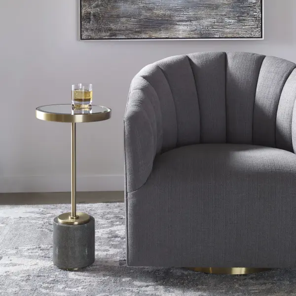 Stylish And Sophisticated, This Round Accent Table Features A Gray Faux Shagreen Base Paired With An Iron Support In Rich Brushed Brass And A Beveled Mirror Top. Collection: Laurier Designer: David Frisch Finish: Brushed Brass Width: 11.75" Height: 24.75" Length: 11.75" Weight: 16.80 lb Material: Metal, Mdf Country of Origin: Vietnam Safety Rating: Indoor Only