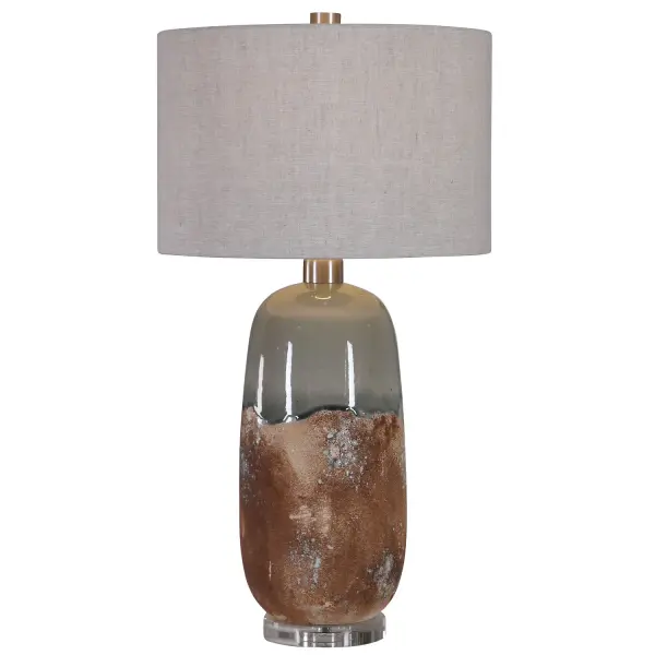 This Table Lamp Features A Ceramic Base Finished In An Earthy Terracotta Rust That Transitions Into A Crackled Green-gray Glaze, Accented With Brushed Nickel Plated Details And A Thick Crystal Foot. The Hardback Drum Shade Is A Warm Gray Linen Fabric With Natural Slubbing. Collection: Maggie Designer: David Frisch Finish: Brushed Nickel Glass: Round Drum Hardback Shade Width: 16.00" Height: 30.25" Length: 16.00" Weight: 12.10 lb Number of Bulbs: 1 Maximum Wattage: 150.00 W Bulb Type: A Voltage: 110.00 V Material: Ceramic, Fabric, Iron, K9Crystal Country of Origin: China Safety Rating: Indoor Only Switch: 3-WAY