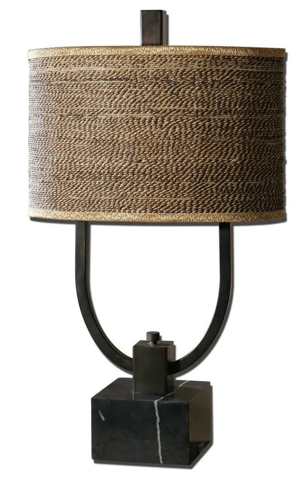 Rustic Bronze Metal With Burnished Edges And A Black Marble Foot. The Oval Drum Shade Is Brown And Tan Woven Rattan With Decorative Trim. Collection: Stabina Designer: Carolyn Kinder Finish: Rustic Bronze Glass: Oval Drum Shade Width: 17.00" Height: 29.50" Length: 10.00" Weight: 26.00 lb Extension from Wall: 17.00" Number of Bulbs: 2 Maximum Wattage: 60.00 W Bulb Type: A Bulb Base: Medium Voltage: 110.00 V Material: Marble, Metal, Cane Country of Origin: China Safety Rating: Indoor Only Switch: ON-OFF