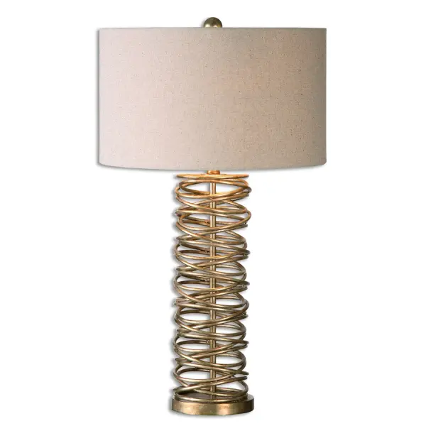 Layered Metal Rings Finished In A Heavily Antiqued Silver Champagne. The Round Hardback Drum Shade Is An Oatmeal Linen Fabric With Light Natural Slubbing. Collection: Amarey Designer: Jim Parsons Finish: Antiqued Silver Champagne Glass: Round Hardback Drum Width: 17.00" Height: 30.00" Length: 17.00" Weight: 6.63 lb Number of Bulbs: 1 Maximum Wattage: 150.00 W Bulb Type: A Voltage: 110.00 V Material: Metal Country of Origin: China Safety Rating: Indoor Only Switch: 3-WAY