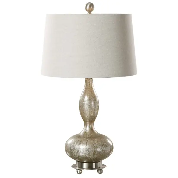 Smoked Mercury Glass Accented With Brushed Nickel Metal Details. The Tapered Round Hardback Shade Is A Light Beige Linen Fabric. Collection: Vercana Designer: David Frisch Finish: Brushed Nickel Glass: Round Tapered Hardback Width: 16.00" Height: 28.25" Length: 10.00" Weight: 11.00 lb Number of Bulbs: 1 Maximum Wattage: 150.00 W Bulb Type: A Voltage: 110.00 V Material: Glass, Metal Country of Origin: China Safety Rating: Indoor Only
