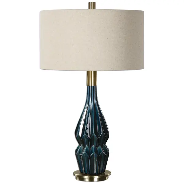 Deep Blue Ceramic Glaze Accented With Plated, Brushed Antique Brass Details. The Round Hardback Drum Shade Is An Oatmeal Linen Fabric With Natural Slubbing. Due To The Nature Of Fired Glazes On Ceramic Lamps, Finishes Will Vary Slightly. Collection: Prussian Designer: David Frisch Finish: Blue Ceramic Glass: Round Hardback Drum Width: 18.00" Height: 31.50" Length: 18.00" Weight: 8.00 lb Number of Bulbs: 1 Maximum Wattage: 150.00 W Bulb Type: A Voltage: 110.00 V Material: Ceramic, Metal Country of Origin: China Safety Rating: Indoor Only Switch: 3-WAY
