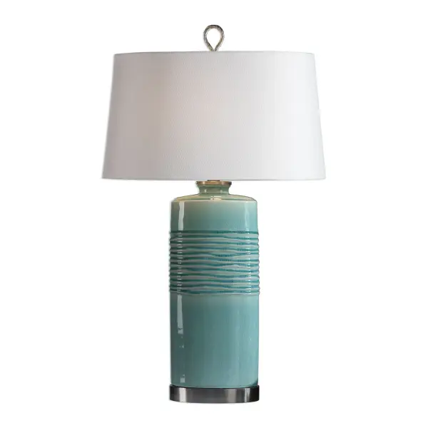 The Oval Column Ceramic Base Is Finished In A Distressed Teal Glaze, Featuring A Hand Applied Imperfect Texture, Accented With Brushed Nickel Plated Details. The Oval Tapered Hardback Shade Is An Off-white Linen Fabric With Natural Slubbing. Due To The Nature Of Fired Glazes On Ceramic Lamps, Finishes Will Vary Slightly. Collection: Rila Designer: Jim Parsons Finish: Brushed Nickel Glass: Oval Tapered Hardback Width: 19.00" Height: 32.00" Length: 13.00" Weight: 11.00 lb Number of Bulbs: 1 Maximum Wattage: 150.00 W Bulb Type: A Voltage: 110.00 V Material: Ceramic & Iron Country of Origin: China Safety Rating: Indoor Only Switch: 3-WAY