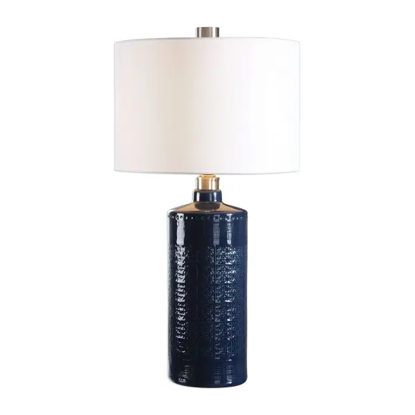 Intricately Embossed Ceramic Finished In A Royal Blue Glaze, Accented With Brushed Nickel Plated Details. The Round Hardback Drum Shade Is A White Linen Fabric With Natural Slubbing. Collection: Thalia Designer: David Frisch Finish: Brushed Nickel Glass: Round Hardback Drum Width: 16.00" Height: 31.00" Length: 16.00" Weight: 8.40 lb Number of Bulbs: 1 Maximum Wattage: 150.00 W Bulb Type: A Voltage: 110.00 V Material: Metal & Ceramic & Fabric Country of Origin: Cambodia Safety Rating: Indoor Only Switch: 3-WAY