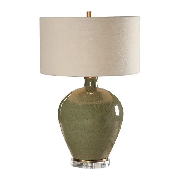 This Ceramic Base Is Finished In A Distressed Emerald Green Glaze, Accented With Antique Brass Plated Details And A Crystal Foot. The Round Hardback Drum Shade Is A Light Beige Linen Fabric With Natural Slubbing. Due To The Nature Of Fired Glazes On Ceramic Lamps, Finishes Will Vary Slightly. Collection: Elva Designer: Jim Parsons Finish: Antique Brass Glass: Round Hardback Drum Width: 18.00" Height: 27.25" Length: 18.00" Weight: 15.00 lb Number of Bulbs: 1 Maximum Wattage: 150.00 W Bulb Type: A Voltage: 110.00 V Material: Steel & Ceramic & Crystal Country of Origin: China Safety Rating: Indoor Only Switch: 3-WAY