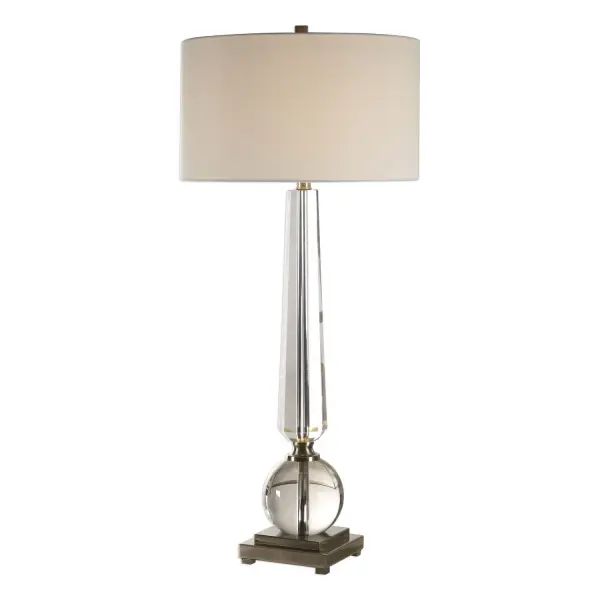 This Elegant Lamp Features A Tapered Cut Crystal Column, Displayed With A Thick Crystal Sphere, Creating A Timeless Design That's Paired With Brushed, Antiqued Nickel Plated Details For An Updated Appeal. The Round Hardback Drum Shade Is A White Linen Fabric. Collection: Crista Designer: Jim Parsons Finish: Brushed Nickel Glass: Round Hardback Drum Width: 17.00" Height: 38.50" Length: 17.00" Weight: 23.80 lb Number of Bulbs: 1 Maximum Wattage: 150.00 W Bulb Type: A Voltage: 110.00 V Material: Steel & Crystal Country of Origin: China Safety Rating: Indoor Only Switch: 3-WAY