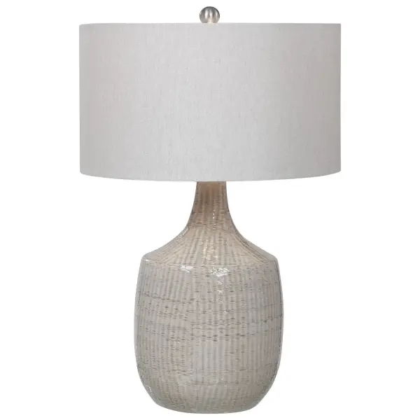 This Ceramic Base Keeps It Simple In Shape, Yet Upscale With Its Fashionable Pattern That's Finished In A Distressed Light Gray Glaze, Paired With Brushed Nickel Plated Accents. The Hardback Drum Shade Is Light Gray Linen Fabric. Collection: Felipe Designer: Jim Parsons Finish: Brushed Nickel Glass: Round Drum Hardback Width: 19.00" Height: 29.00" Length: 19.00" Weight: 12.10 lb Number of Bulbs: 1 Maximum Wattage: 150.00 W Bulb Type: A Voltage: 110.00 V Material: Ceramic, Iron, Fabric Country of Origin: China Safety Rating: Indoor Only Switch: 3-WAY