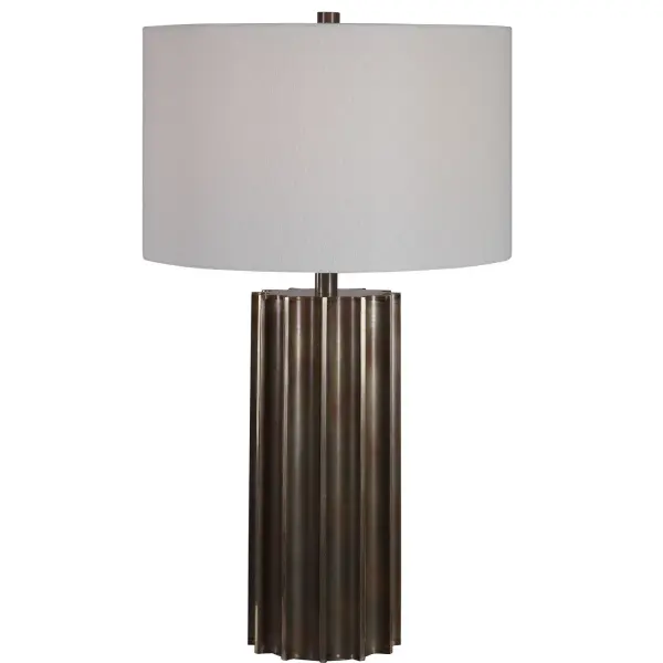 This Table Lamp Features A Deep Fluted Steel Base Finished In An Aged Gunmetal With Rust Distressing And Brass Plated Edges, For A Rustic Industrial Feel. The Round Hardback Drum Shade Is A White Linen Fabric. Collection: Khalio Designer: Carolyn Kinder Finish: Aged Gun Metal Glass: Round Drum Hardback Width: 16.00" Height: 27.50" Length: 16.00" Weight: 16.00 lb Number of Bulbs: 1 Maximum Wattage: 150.00 W Bulb Type: A Voltage: 110.00 V Material: Steel, Fabric Country of Origin: China Safety Rating: Indoor Only Switch: 3-WAY