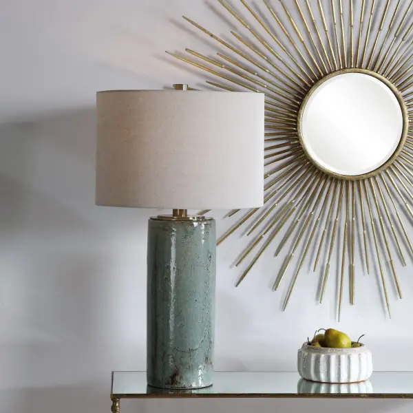 Ceramic Table Lamp Finished In A Crackled Aqua Blue Glaze With Dark Rustic Bronze Distressing, Accented With Light Antique Brushed Brass Details. The Round Hardback Drum Shade Is A Light Beige Linen Fabric. Collection: Callais Designer: Carolyn Kinder Finish: Brushed Nickel Glass: Round Hardback Drum Width: 18.00" Height: 32.50" Length: 18.00" Weight: 21.00 lb Number of Bulbs: 1 Maximum Wattage: 150.00 W Bulb Type: A Voltage: 110.00 V Material: Ceramic & Metal Country of Origin: China Safety Rating: Indoor Only Switch: 3-WAY