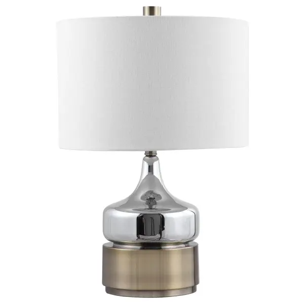 Paying Homage To Mid-century Style, This Table Lamp Features A Chrome Plated Glass Base Displayed On A Chunky Antique Brass Plated Foot And Finial. The Lamp Is Complemented By A Round Drum Shade In A White Linen Fabric. Collection: Como Designer: David Frisch Finish: Antique Brass Glass: Round Drum Hardback Shade Width: 15.50" Height: 23.00" Length: 15.50" Weight: 6.60 lb Number of Bulbs: 1 Maximum Wattage: 150.00 W Bulb Type: A Voltage: 110.00 V Material: Metal & Glass & Fabric Country of Origin: Cambodia Safety Rating: Indoor Only Switch: 3-WAY