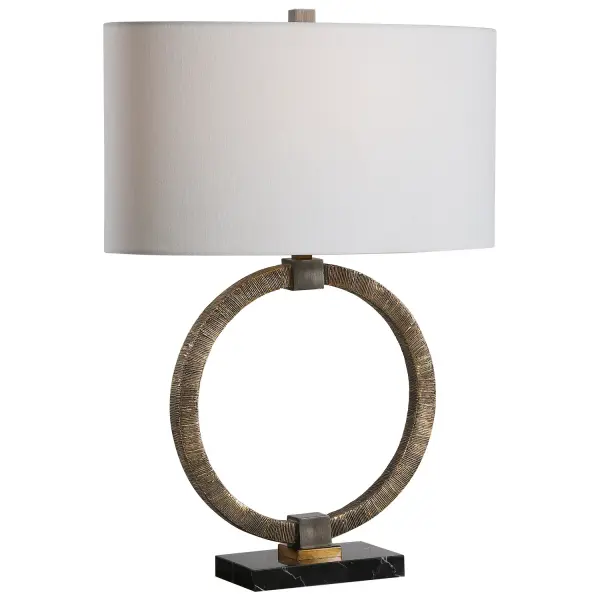 Inspired By Tribal And Bohemian Styles, This Table Lamp Features A Heavily Antiqued Gold Finish With Hand Carved Texture, Dark Bronze Accents And A Black Marble Foot. The Lamp Is Paired With A Oval Hardback White Linen Shade. Collection: Relic Designer: John Kowalski Finish: Dark Bronze Glass: Oval Hardback Shade Width: 19.00" Height: 26.00" Length: 10.00" Weight: 7.90 lb Number of Bulbs: 1 Maximum Wattage: 150.00 W Bulb Type: A Voltage: 110.00 V Material: Resin, Marble, Iron, Fabric Country of Origin: China Safety Rating: Indoor Only