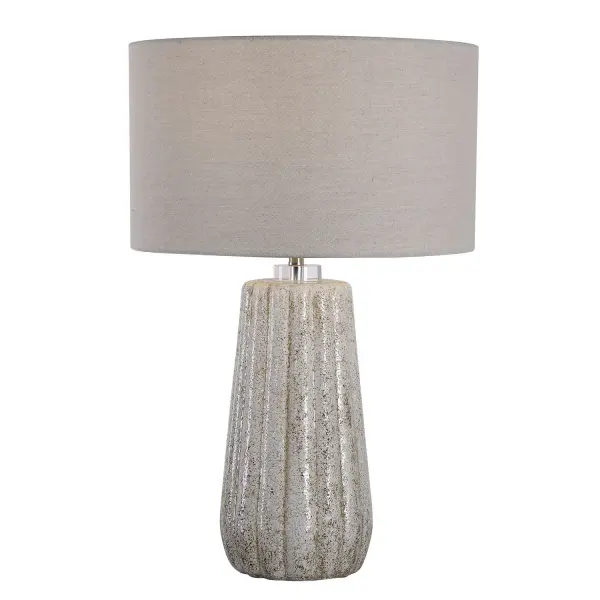 This Ceramic Table Lamp Features A Fluted Design With A Porous Texture Finished In A Stone-ivory And Taupe Glaze, Accented With Brushed Nickel Plated Details And A Thick Crystal Collar. A Light Gray Fabric Drum Shade Completes The Look. Collection: Pikes Designer: Osvaldo Mendoza Finish: Brushed Nickel Glass: Round Drum Hardback Width: 17.00" Height: 26.00" Length: 17.00" Weight: 9.00 lb Number of Bulbs: 1 Maximum Wattage: 150.00 W Bulb Type: A Voltage: 110.00 V Material: Ceramic, Steel, Crystal Country of Origin: China Safety Rating: Indoor Only