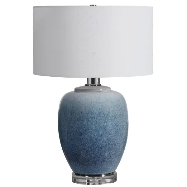 Ceramic Table Lamp Showcases Vibrant Shades Of Cobalt And Aqua That Transition Into A Subtle Ombre Toned Light Blue. Polished Nickel Details And Crystal Accents Create An Elegant And Sophisticated Look. A Crisp White Linen Drum Shade Accents The Piece. Collection: Blue Waters Designer: Renee Wightman Finish: Polished Nickel Glass: Drum Hardback Rolled Edge Width: 18.00" Height: 26.50" Length: 18.00" Weight: 13.10 lb Number of Bulbs: 1 Maximum Wattage: 150.00 W Bulb Type: A Voltage: 110.00 V Material: Steel, Ceramic, Crystal, Fabric Country of Origin: China Safety Rating: Indoor Only