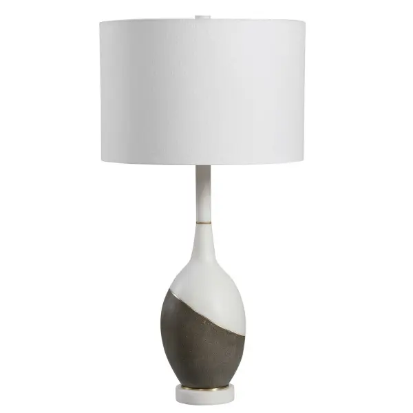 Simple Yet Sophisticated, This Table Lamp Features A Combination Of Honed Charcoal Concrete And A Polished White Marble Look, Accented By Brushed Gold Plated Accents. The Lamp Is Complemented By A Crisp White Hardback Drum Shade. Collection: Tanali Designer: Renee Wightman Finish: Brushed Gold Glass: Round Drum Hardback Width: 15.00" Height: 28.50" Length: 15.00" Weight: 7.28 lb Number of Bulbs: 1 Maximum Wattage: 150.00 W Bulb Type: A Voltage: 110.00 V Material: Copper, Concrete, Resin, Iron, Fabric Country of Origin: China Safety Rating: Indoor Only
