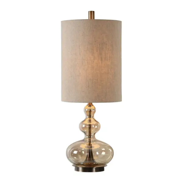 Curvaceous, Light Amber Glass Accented With Antique Brass Plated Steel Details. The Tall, Round Hardback Shade Is A Khaki Linen Fabric With Natural Slubbing. Collection: Formoso Designer: David Frisch Finish: Antique Brass Steel Glass: Tall, Round Hardback Drum Width: 12.00" Height: 32.75" Length: 12.00" Weight: 7.00 lb Number of Bulbs: 1 Maximum Wattage: 150.00 W Bulb Type: A Voltage: 110.00 V Material: Steel & Glass & Fabric Country of Origin: China Safety Rating: Indoor Only Switch: 3-WAY