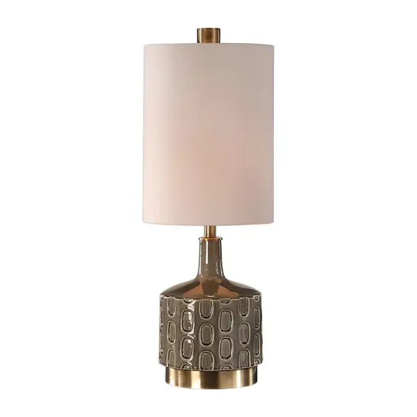 Finished In A Crackled Gray Glaze, This Ceramic Table Lamp Echoes Mid-century And Contemporary Styles. The Base Of This Piece Showcases An Embossed Repeating Geometric Design, Accented With Antique Brass Plated Details. The Round Hardback Shade Is A White Linen Fabric With Natural Slubbing. Collection: Darrin Designer: David Frisch Finish: Antique Brass Glass: Tall, Round Hardback Drum Width: 11.00" Height: 30.00" Length: 11.00" Weight: 7.26 lb Number of Bulbs: 1 Maximum Wattage: 150.00 W Bulb Type: A Voltage: 110.00 V Material: Ceramic, Shade, Metal, Fabric Country of Origin: Cambodia Safety Rating: Indoor Only Switch: 3-WAY