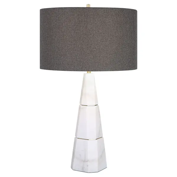 Modern Yet Classic, This Table Lamp Displays An Elegant White Honed Marble Base With Natural Gray Veining And Metal Accents Finished In Antique Brass. A Charcoal Gray Drum Shade Complements The Piece. Collection: Citadel Designer: Matthew Williams Finish: Antique Brass Glass: Round Hardback Shade With White Lining Back Width: 17.00" Height: 28.75" Length: 17.00" Weight: 8.84 lb Number of Bulbs: 1 Maximum Wattage: 150.00 W Bulb Type: A Voltage: 110.00 V Material: Marble, Iron , Fabric Country of Origin: China Safety Rating: Indoor Only