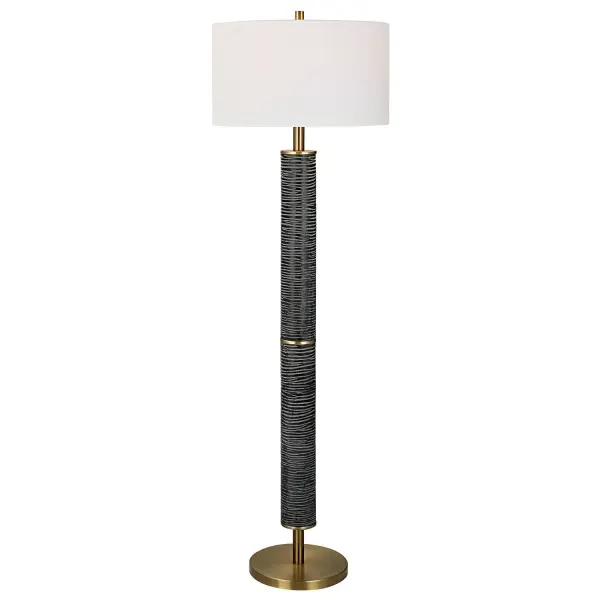 This Floor Lamp Features An Organically Carved Design In A Rustic Gray-black With Solid Iron Details Finished In Plated Antique Brass. The Lamp Is Paired With A Hardback Drum Shade In A White Linen Fabric. Collection: Summit Designer: David Frisch Finish: Antique Brass Glass: Round Drum Hardback Shade Width: 19.00" Height: 62.75" Length: 19.00" Weight: 25.60 lb Number of Bulbs: 1 Maximum Wattage: 150.00 W Bulb Type: A Voltage: 110.00 V Material: Resin, Iron, Shade Country of Origin: China Safety Rating: Indoor Only