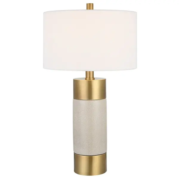 Sophisticated And Versatile, This Table Lamp Displays A Solid Iron Base Finished In Warm Brushed Brass With An Ivory Crackle Glazed Ceramic Center. The Hardback Drum Shade Is Covered In A White Cotton Fabric. Collection: Adelia Designer: David Frisch Finish: Antique Brass Iron Glass: Round Drum Hardback Shade Width: 17.00" Height: 30.50" Length: 17.00" Weight: 6.00 lb Number of Bulbs: 1 Maximum Wattage: 150.00 W Bulb Type: A Voltage: 110.00 V Material: Iron & Ceramic & Fabric Country of Origin: China Safety Rating: Indoor Only