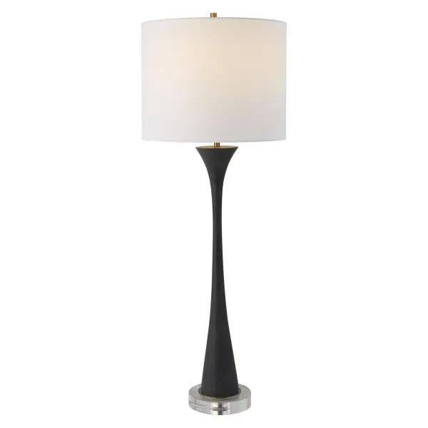 Showcasing A Classic Trumpet Shape, This Buffet Lamp Is Handcrafted From A Man-made Black Stone, Displayed On A Thick Crystal Foot, Paired With Brushed Brass Plated Accents. A White Fabric Shade Completes The Piece. Collection: Fountain Designer: Carolyn Kinder Finish: Brushed Brass Plated Glass: Round Hardback Drum Width: 12.00" Height: 34.00" Length: 12.00" Weight: 7.00 lb Number of Bulbs: 1 Maximum Wattage: 150.00 W Bulb Type: A Voltage: 110.00 V Material: Faux Stone, Iron, Fabric, Crystal Country of Origin: China Safety Rating: Indoor Only