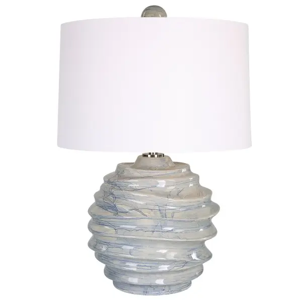 A Contemporary Take On Classic Blue And White Ceramics, This Ceramic Lamp Features A Unique Sculpted Design With A Hand Applied Light Cobalt Blue Drip Glaze And A Oversized Matching Ceramic Finial, Paired With Brushed Nickel Plated Details. The Table Lamp Is Paired With A Crisp White Hardback Drum Shade. Collection: Waves Designer: Renee Wightman Finish: Cobalt Blue Glass: Tapered Drum Hardback Width: 18.00" Height: 26.00" Length: 18.00" Weight: 9.50 lb Number of Bulbs: 1 Maximum Wattage: 150.00 W Bulb Type: A Voltage: 110.00 V Material: Ceramic, Iron, Fabric Country of Origin: China Safety Rating: Indoor Only