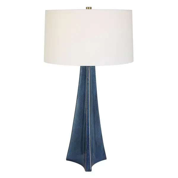 This Tapered Ceramic Base Features Softly Scalloped Sides Finished In A Lightly Distressed Blue Ombre With Subtle Warm Brown Undertones On The Edges, Accented With Plated Brushed Nickel Details. The Slightly Tapered Drum Shade Is Covered In A Crisp White Linen Fabric. Due To The Nature Of Fired Glazes On Ceramic Lamps, Finishes Will Vary Slightly. Collection: Teramo Designer: Carolyn Kinder Finish: Brushed Nickel Glass: Round Hardback Shade Width: 18.00" Height: 32.00" Length: 18.00" Weight: 7.00 lb Number of Bulbs: 1 Maximum Wattage: 150.00 W Bulb Type: A Voltage: 110.00 V Material: Ceramic, Iron, Fabric Country of Origin: China Safety Rating: Indoor Only