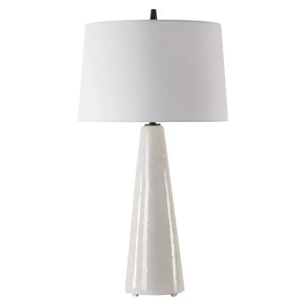 Simple Yet Versatile, This Ceramic Table Lamp Features A Cream-ivory Drip Glaze With Subtle Texture, Accented With Matte Black Details. The Lamp Is Paired With A Tapered Round Hardback Shade In A Crisp White Linen Fabric. Collection: Loire Designer: Carolyn Kinder Finish: Matte Black Glass: Tapered Round Hardback Shade Width: 19.00" Height: 35.75" Length: 19.00" Weight: 10.00 lb Number of Bulbs: 1 Maximum Wattage: 150.00 W Bulb Type: A Voltage: 110.00 V Material: Ceramic, Iron, Fabric Country of Origin: China Safety Rating: Indoor Only