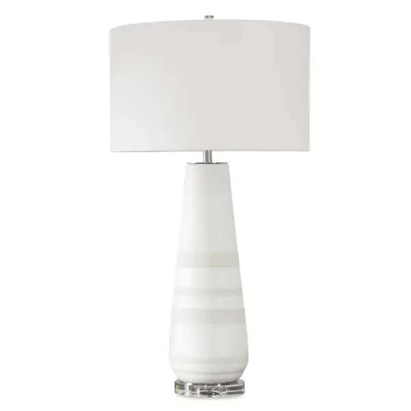 Showcasing A Crackled Ivory Ceramic Base With Heavily Textured Dove Gray Bands For A Touch Of Earthy Elegance. Resting On A Thick Crystal Foot And Accented With Brushed Plated Nickel Finishes, This Lamp Brings A Serene Sophistication To Any Room. The Round Drum Shade Is Covered In A Crisp White Linen Fabric. Due To The Nature Of Fired Glazes On Ceramic Lamps, Finishes Will Vary Slightly. Collection: Santino Designer: Grace Feyock Finish: Brushed Nickel Glass: Drum With Liner Width: 17.00" Height: 32.25" Length: 17.00" Weight: 13.00 lb Number of Bulbs: 1 Maximum Wattage: 150.00 W Bulb Type: A Voltage: 110.00 V Material: Ceramic, Fabric, Metal Country of Origin: Vietnam Safety Rating: Indoor Only