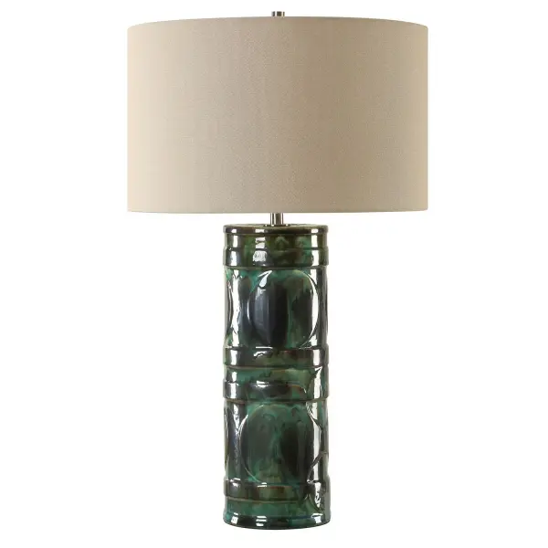 The Loch Table Lamp Features A Ceramic Base, Embellished With A Peacock Green And Slate Glaze, Adding A Sense Of Depth And Richness To Any Space. Light Rust Accents Provide A Touch Of Warmth, While Plated Brushed Nickel Hardware Adds A Contemporary Edge. The Round Drum Hardback Shade Is A Beige Linen Fabric. Due To The Nature Of Fired Glazes On Ceramic Lamps, Finishes Will Vary Slightly. Collection: Loch Designer: Renee Wightman Finish: Brushed Nickel Width: 17.00" Height: 28.25" Length: 17.00" Weight: 7.94 lb Number of Bulbs: 1 Maximum Wattage: 150.00 W Bulb Type: A Voltage: 110.00 V Material: Ceramic, Iron, Fabric Country of Origin: China Safety Rating: Indoor Only