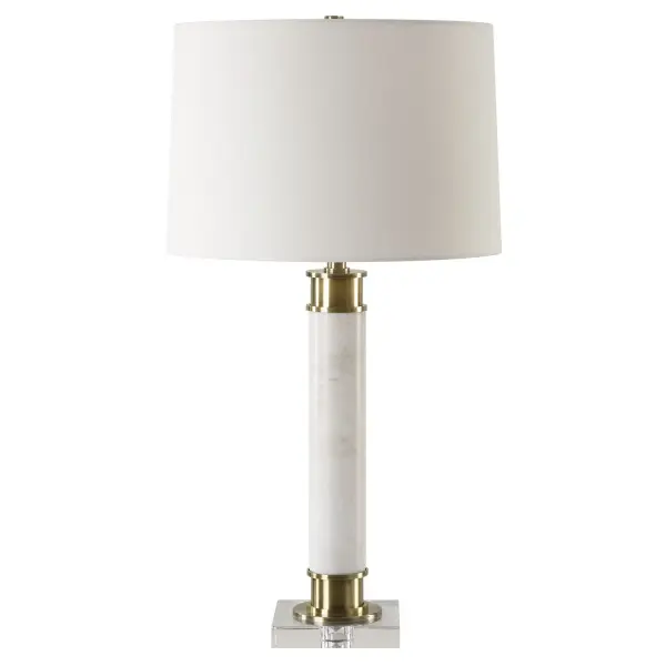 Crafted From White Marble With Subtle Veining, This Table Lamp Is Displayed On A Thick Crystal Foot, Complemented By Plated Antique Brass Accents. A Slightly Tapered Hardback Shade In A Crisp White Linen Fabric Complements The Piece. Collection: Plinth Designer: Jim Parsons Finish: Antique Brass Glass: Round Hardback Width: 15.00" Height: 27.75" Length: 15.00" Weight: 12.40 lb Number of Bulbs: 1 Maximum Wattage: 100.00 W Bulb Type: A Voltage: 110.00 V Material: Metal/Marble/Crystal/Fabric Country of Origin: China Safety Rating: Indoor Only