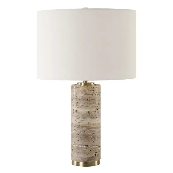 Featuring An Unfilled Honed Travertine Base Paired With Sophisticated Plated Antique Brass Accents. This Piece Combines Natural Beauty With A Touch Of Luxury, Making It A Perfect Addition To Any Decor Seeking A Balance Of Earthiness And Refinement. A Round Hardback Drum Shade Made With A Crisp White Linen Fabric Completes The Piece. Collection: Cortado Designer: Jim Parsons Finish: Antique Brass Glass: Round Hardback Drum Shade Width: 15.00" Height: 23.25" Length: 15.00" Weight: 18.80 lb Number of Bulbs: 1 Maximum Wattage: 150.00 W Bulb Type: A Voltage: 110.00 V Material: Iron/Travertine / Fabric Country of Origin: China Safety Rating: Indoor Only