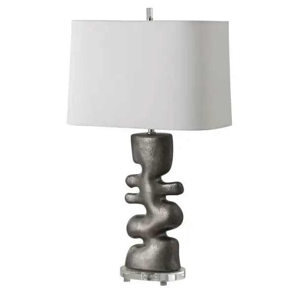 This Lamp Is The Perfect Harmony Of Art And Function. Featuring A Free Flowing, Carefree Designed Base In A Tarnished Nickel Glaze And Accented By A Thick Clear Crystal Foot And Polished Nickel Plated Details. The Rectangle Round Cornered Hardback Shade Is A Crisp White Linen Fabric. Collection: Free Flowing Designer: David Frisch Finish: Tarnished Nickel Glass: Rectangle Round Cornered Hardback Rolled Edge Width: 16.00" Height: 28.50" Length: 10.50" Weight: 6.60 lb Number of Bulbs: 1 Maximum Wattage: 150.00 W Bulb Type: A Voltage: 110.00 V Material: Steel & Crystal & Ceramic & Fabric Country of Origin: China Safety Rating: Indoor Only