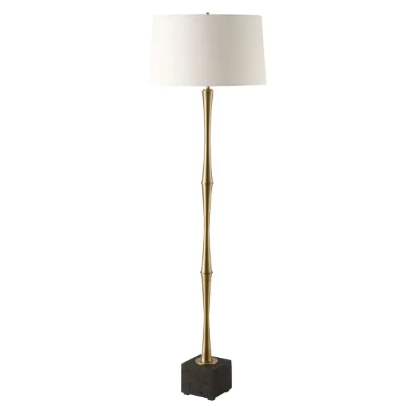 The Shino Floor Lamp Seamlessly Blends Both Contemporary And Traditional Decors. Crafted In Iron And Finished In Plated Antique Brass, The Timeless Design Is Displayed On A Thick Black Travertine Foot. The Slightly Tapered Round Hardback Shade Is A White Linen Fabric With Light Slubbing. Collection: Shino Designer: David Frisch Finish: Antique Brass Glass: Round Hardback Shade Width: 20.00" Height: 66.00" Length: 20.00" Weight: 27.50 lb Number of Bulbs: 1 Maximum Wattage: 150.00 W Bulb Type: A Voltage: 110.00 V Material: Iron & Travertine & Fabric Country of Origin: Vietnam Safety Rating: Indoor Only