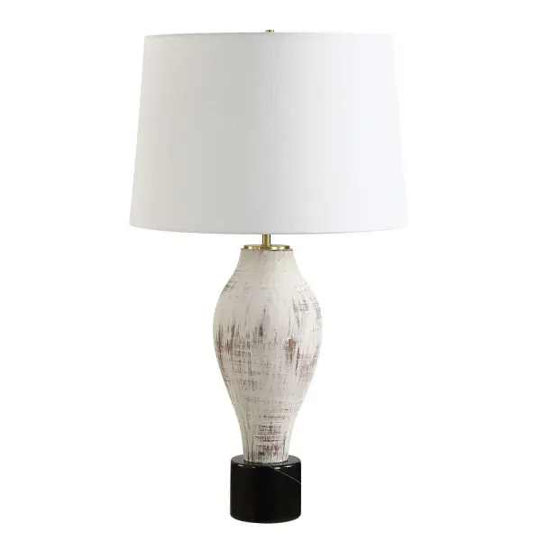 The Magdalene Table Lamp Exudes Rustic Elegance With Its Heavily Distressed Porcelain Base, Perfectly Contrasted By A Black Marble Foot, And Accented With Plated Brass Details. The Tapered Round Hardback Shade Is A Crisp White Linen Fabric. Collection: Magdaline Designer: David Frisch Finish: Plated Brass Glass: Round Hardback Shade Width: 17.00" Height: 29.50" Length: 17.00" Weight: 13.00 lb Number of Bulbs: 1 Maximum Wattage: 150.00 W Bulb Type: A Voltage: 110.00 V Material: Porcelain & Marble & Fabric & Steel Country of Origin: China Safety Rating: Indoor Only
