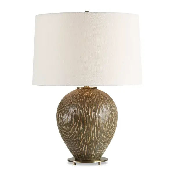 The Rya Table Lamp Features A Distressed Rich Brown Ceramic Base With Organic Texture That Evokes A Natural, Earthy Feel, Complemented By Plated Antique Brass Accents. The Slightly Tapered Round Hardback Shade Is In A Casual White Linen Fabric. Collection: Rya Designer: Jim Parsons Finish: Antique Brass Glass: Round Hardback Rolled Edge Width: 17.00" Height: 23.75" Length: 17.00" Weight: 8.80 lb Number of Bulbs: 1 Maximum Wattage: 150.00 W Bulb Type: A Voltage: 110.00 V Material: Steel & Ceramic, Fabric Country of Origin: China Safety Rating: Indoor Only