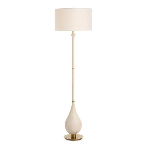 Featuring A Teardrop-shaped Base Made Of Ivory Man-made Stone That Accurately Replicates The Look Of Thassos Marble, Accented With Plated Brushed Antique Brass Details, The Dewdrop Floor Lamp Is A Refined Addition To Any Space. The Round Hardback Shade Is A Crisp White Linen Fabric. Collection: Dewdrop Designer: Carolyn Kinder Finish: Brushed Antique Brass Glass: Round Drum Hardback Shade Width: 18.00" Height: 64.00" Length: 18.00" Weight: 24.00 lb Number of Bulbs: 1 Maximum Wattage: 150.00 W Bulb Type: A Voltage: 110.00 V Material: Metal, Rice Stone, Fabric Country of Origin: China Safety Rating: Indoor Only