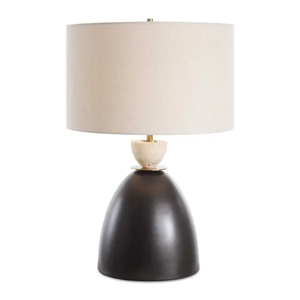 Featuring A Distinctive Dark Bronze Iron Base Paired With A Contrasting Travertine Stone Ornament, The Procida Table Lamp Effortlessly Blends Sophistication And Contemporary Style, Making It A Striking Addition To Any Space. The Round Hardback Shade Is Covered In A Light Beige Linen Fabric With Natural Slubbing. Collection: Procida Designer: Osvaldo Mendoza Finish: Dark Bronze Glass: Round Drum Hardback Shade Width: 16.00" Height: 24.50" Length: 16.00" Weight: 9.00 lb Number of Bulbs: 1 Maximum Wattage: 150.00 W Bulb Type: A Voltage: 110.00 V Material: Iron, Stone, Fabric Country of Origin: China Safety Rating: Indoor Only