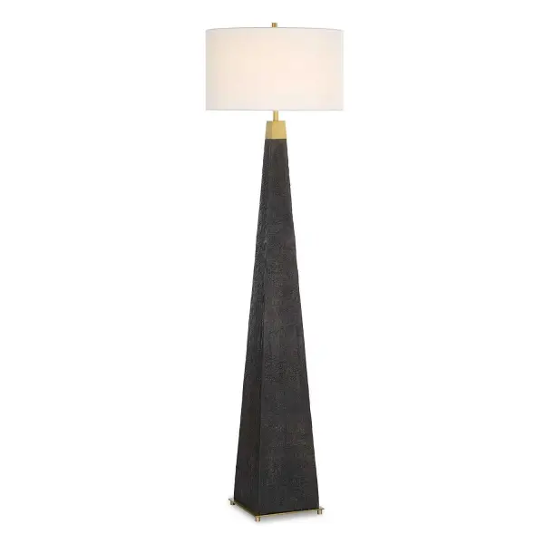 The Lathey Floor Lamp Showcases A Tapered Base With A Burned Wood Look Replicating The Timeless Shou Sugi Ban Technique Of Preserving Wood, Accented With Plated Brass Details. The Round Hardback Drum Shade Is A Casual White Linen Fabric. Collection: Lathey Designer: Osvaldo Mendoza Finish: Brass Glass: Round Drum Hardback Shade Width: 19.00" Height: 68.00" Length: 19.00" Weight: 23.00 lb Number of Bulbs: 1 Maximum Wattage: 150.00 W Bulb Type: A Voltage: 110.00 V Material: Resin, Iron, Fabric Country of Origin: China Safety Rating: Indoor Only
