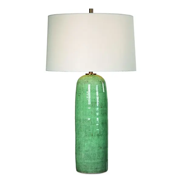 The Anadale Table Lamp Exudes A Minimalist Yet Stylish Design, Showcasing A Lightly Distressed, Crackled Teal Ceramic Base, Complemented By Plated Antique Brass Accents. The Slightly Tapered Round Hardback Shade Is In A Casual White Linen Fabric. Due To The Nature Of Fired Glazes On Ceramic Lamps, Finishes May Vary Slightly. Collection: Andale Designer: Matthew Williams Finish: Antique Brass Glass: Tapered Round Hardback Shade Width: 17.00" Height: 30.25" Length: 17.00" Weight: 15.09 lb Number of Bulbs: 1 Maximum Wattage: 150.00 W Bulb Type: A Voltage: 110.00 V Material: Steel, Ceramic, Fabric Country of Origin: China Safety Rating: Indoor Only