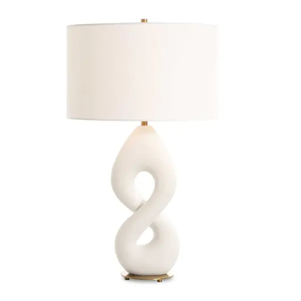 The Meridian Table Lamp Features A Unique Infinity Shape That Adds A Modern Flair To Classic Design. Its Rich Ivory Man-made Stone That Accurately Replicates The Look Of Thassos Marble Is Complemented By A Plated Antique Brass Foot And Matching Hardware. The Lamp Is Paired With A Hardback Drum Shade Covered In A White Linen Fabric. Collection: Meridian Designer: David Frisch Finish: Antique Brass Glass: Round Drum Hardback Shade Width: 17.00" Height: 29.00" Length: 17.00" Weight: 11.00 lb Number of Bulbs: 1 Maximum Wattage: 150.00 W Bulb Type: A Voltage: 110.00 V Material: Resin, Iron , Fabric Country of Origin: China Safety Rating: Indoor Only