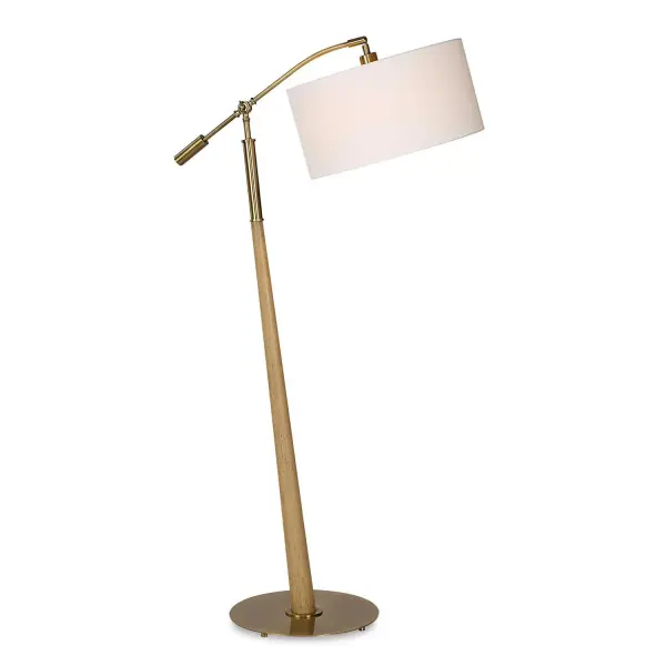 The Kennett Floor Lamp's Blend Of Modern And Classic Materials Makes It A Versatile Choice For Any Space. It Features A Tapered Wooden Base Balanced On A Plated Antique Brass Foot, Complemented By A Matching Adjustable Shade Arm. The Round Hardback Drum Shade Is A Casual White Linen Fabric. Collection: Kennett Designer: David Frisch Finish: Antique Brass Glass: Round Drum Hardback Shade Width: 33.75" Height: 62.00" Length: 18.00" Weight: 15.00 lb Number of Bulbs: 1 Maximum Wattage: 150.00 W Bulb Type: A Voltage: 110.00 V Material: Iron & Rubber Wood & Fabric Country of Origin: Vietnam Safety Rating: Indoor Only