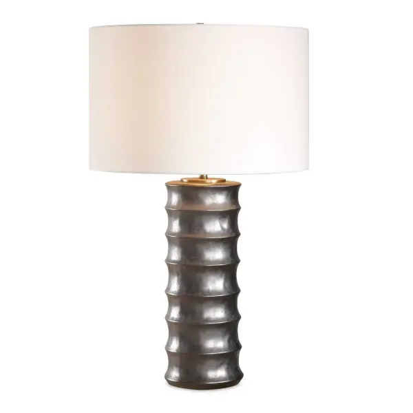 Made From Porcelain, The Corvair Table Lamp Features A Timeless Scalloped Design Finished In Metallic Dark Bronze Glaze, Paired With Brass Plated Details That Adds Depth And Dimension To Its Sleek Design. The Round Hardback Drum Shade Is Made In A Casual White Linen Fabric. Collection: Corvair Designer: David Frisch Finish: Dark Bronze Glass: Round Drum Hardback Shade Width: 17.00" Height: 28.50" Length: 17.00" Weight: 6.60 lb Number of Bulbs: 1 Maximum Wattage: 150.00 W Bulb Type: A Voltage: 110.00 V Material: Porcelain & Fabric & Steel Country of Origin: China Safety Rating: Indoor Only