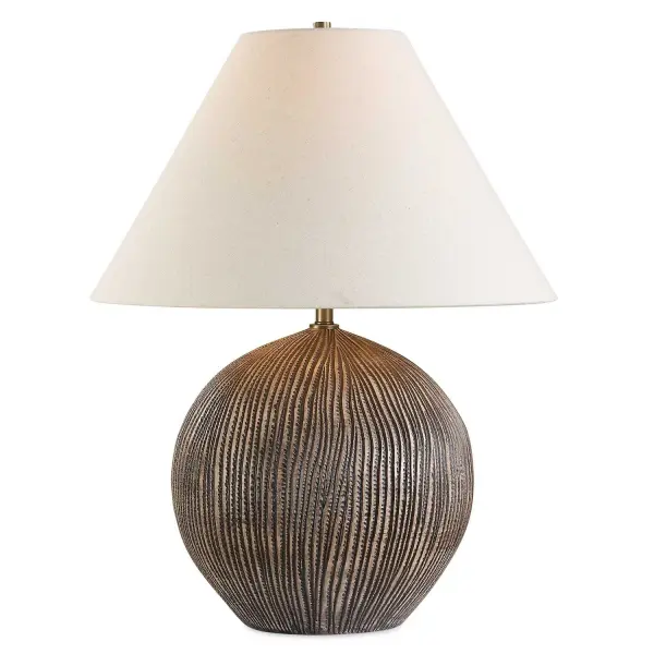 The Sayre Table Lamp Features A Heavily Textured Porcelain Base With Chiseled Grooves Finished In A Rubbed Dark Brown Paired With Black Accents. The Coolie Style Large Round Shade Is Covered In A Casual Oatmeal Linen Fabric. Collection: Sayre Designer: David Frisch Finish: Rubbed Dark Brown Glass: Round Hardback Shade Width: 20.00" Height: 25.50" Length: 20.00" Weight: 16.30 lb Number of Bulbs: 1 Maximum Wattage: 150.00 W Bulb Type: A Voltage: 110.00 V Material: Porcelain & Fabric & Steel Country of Origin: China Safety Rating: Indoor Only